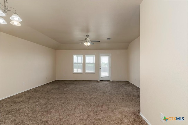 5305 Eagles Nest Dr, Killeen, TX 76549 - spare room featuring dark colored carpet, ceiling fan, and a chandelier