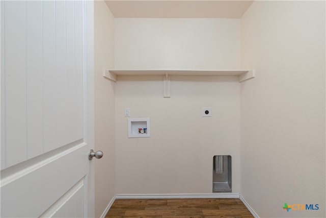 washroom with hookup for a washing machine, hardwood / wood-style flooring, and electric dryer hookup