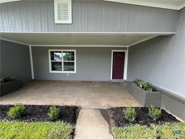 3004 Mayfair Dr, Victoria, TX 77901 - view of exterior entry with a patio area