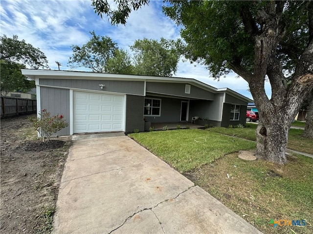 3004 Mayfair Dr, Victoria, TX 77901 - view of front of property featuring a garage and driveway