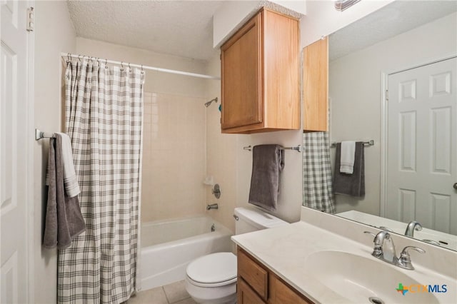 7401 Napier Trl, Austin, TX 78729 - bathroom featuring vanity, shower / tub combo with curtain, a textured ceiling, and tile patterned floors
