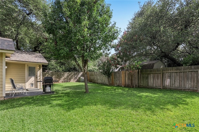 7401 Napier Trl, Austin, TX 78729 - fenced backyard featuring a patio area