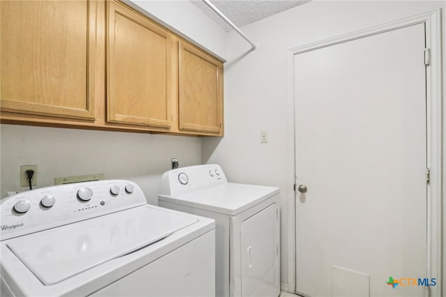 7401 Napier Trl, Austin, TX 78729 - laundry area featuring cabinet space and washing machine and clothes dryer