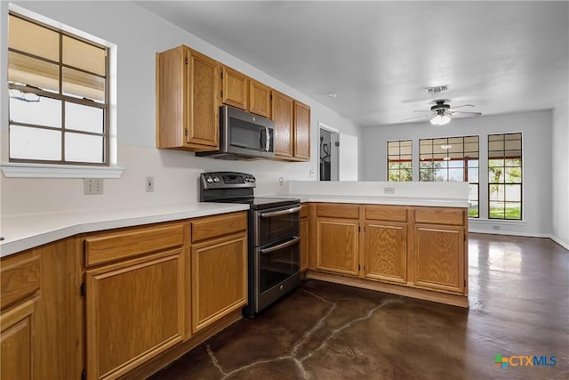 kitchen featuring ceiling fan, kitchen peninsula, and stainless steel appliances