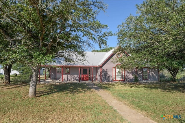 view of front facade with a front lawn