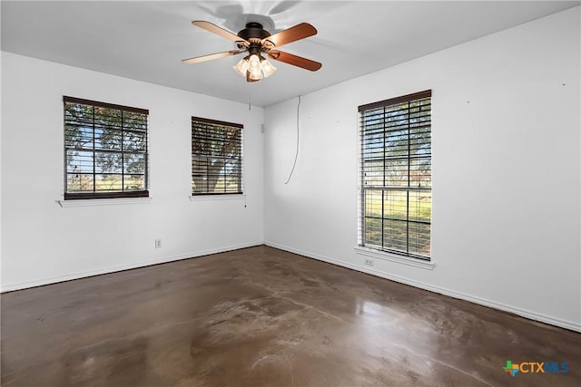 unfurnished room featuring ceiling fan