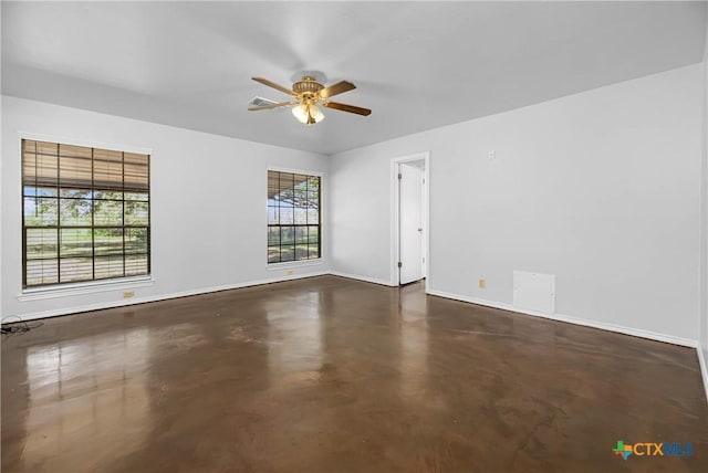 unfurnished room with ceiling fan