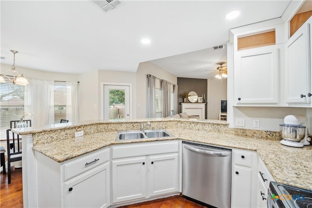 2627 Butterfly Dr, Temple, TX 76502 - kitchen featuring stainless steel dishwasher, a sink, ceiling fan, range, and white cabinets