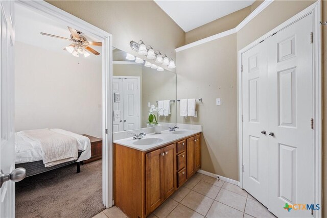 2627 Butterfly Dr, Temple, TX 76502 - bathroom with double vanity, tile patterned floors, ceiling fan, baseboards, and connected bathroom