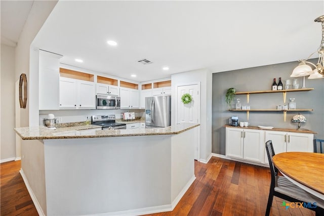 2627 Butterfly Dr, Temple, TX 76502 - kitchen featuring stainless steel appliances, baseboards, dark wood-style floors, light stone countertops, and recessed lighting