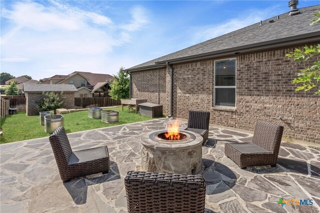 2037 Heritage Loop, Nolanville, TX 76559 - view of patio / terrace with an outdoor fire pit