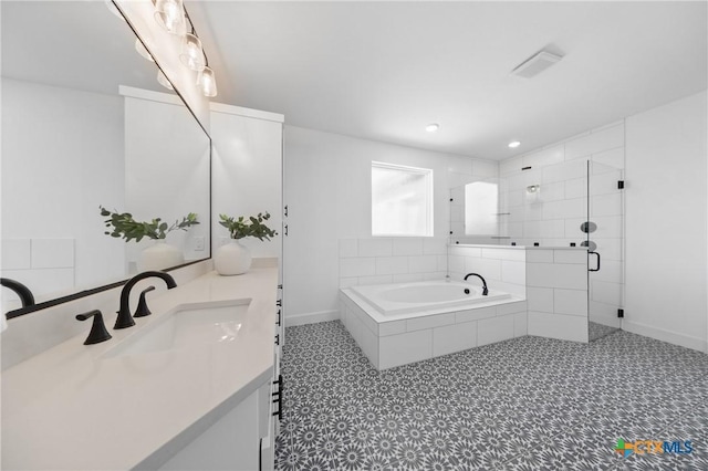 2037 Heritage Loop, Nolanville, TX 76559 - bathroom featuring vanity, a bath, a shower stall, and recessed lighting