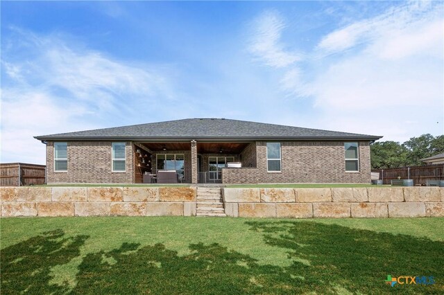 2037 Heritage Loop, Nolanville, TX 76559 - rear view of house with brick siding and ceiling fan