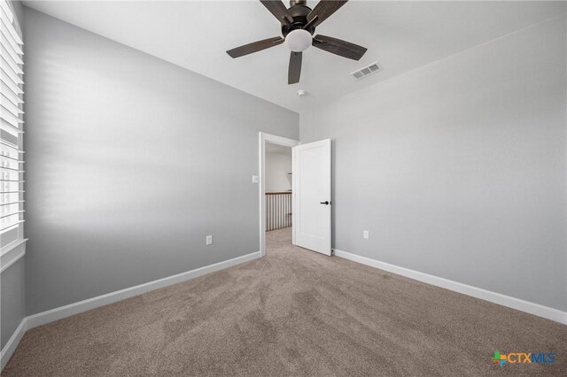 2037 Heritage Loop, Nolanville, TX 76559 - empty room featuring carpet and a ceiling fan