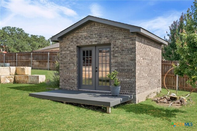 2037 Heritage Loop, Nolanville, TX 76559 - view of outbuilding with a fenced backyard and french doors