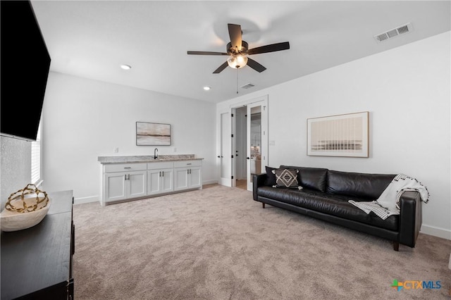 2037 Heritage Loop, Nolanville, TX 76559 - living room with a ceiling fan, light colored carpet, and recessed lighting