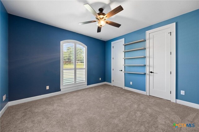 2037 Heritage Loop, Nolanville, TX 76559 - unfurnished bedroom featuring carpet floors and ceiling fan