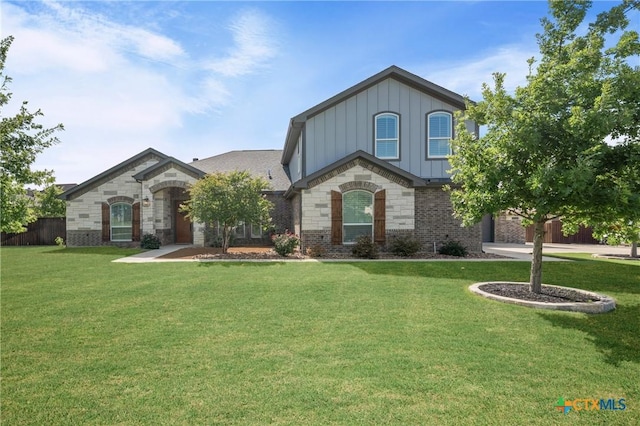 2037 Heritage Loop, Nolanville, TX 76559 - view of front of property with board and batten siding and brick siding