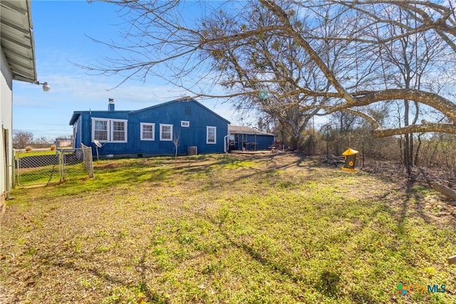 view of yard featuring a gate and fence