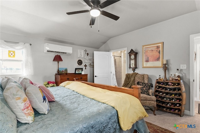 bedroom with an AC wall unit, lofted ceiling, carpet flooring, and ceiling fan