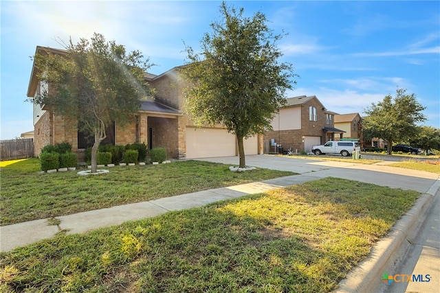 view of property hidden behind natural elements with a front yard