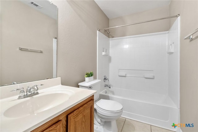 full bathroom featuring vanity, visible vents, shower / washtub combination, tile patterned floors, and toilet