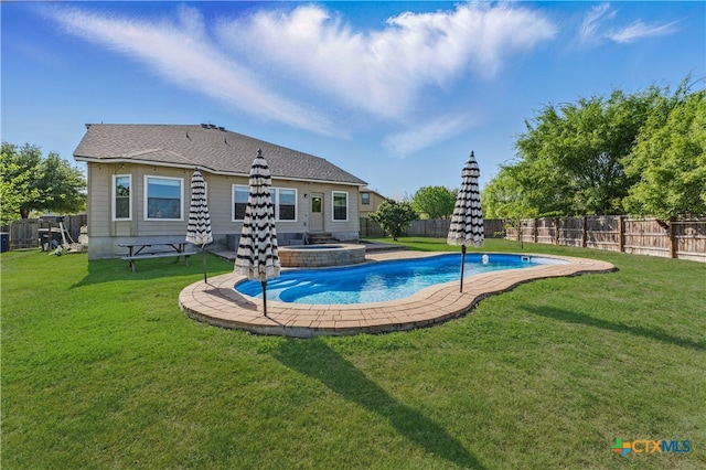 2441 Ibis Ave, New Braunfels, TX 78130 - view of pool with a yard, a pool with connected hot tub, and a fenced backyard