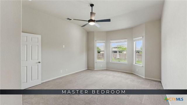2441 Ibis Ave, New Braunfels, TX 78130 - carpeted empty room with baseboards, a ceiling fan, and visible vents
