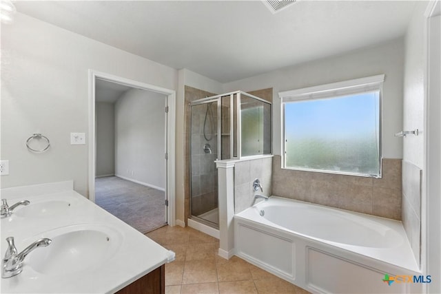 2441 Ibis Ave, New Braunfels, TX 78130 - full bathroom with a shower stall, tile patterned floors, and a sink