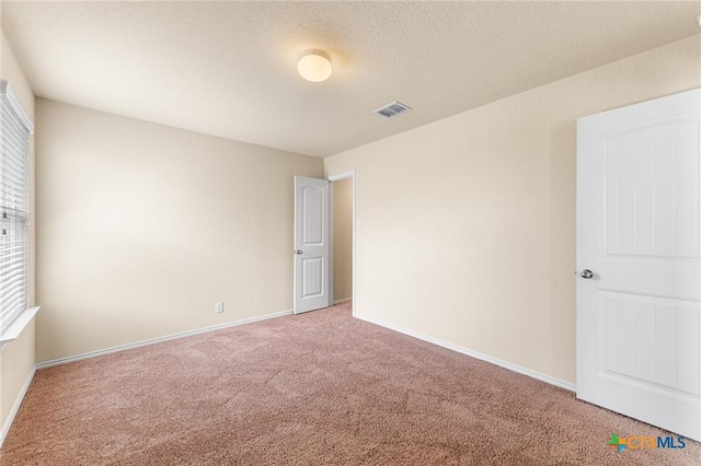 10055 Strasbourg Way, Schertz, TX 78154 - spare room with carpet and baseboards