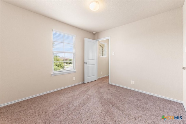 10055 Strasbourg Way, Schertz, TX 78154 - unfurnished room featuring light carpet and baseboards