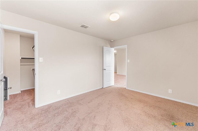 10055 Strasbourg Way, Schertz, TX 78154 - unfurnished bedroom with carpet floors, a spacious closet, and a closet