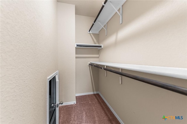 10055 Strasbourg Way, Schertz, TX 78154 - walk in closet featuring dark carpet