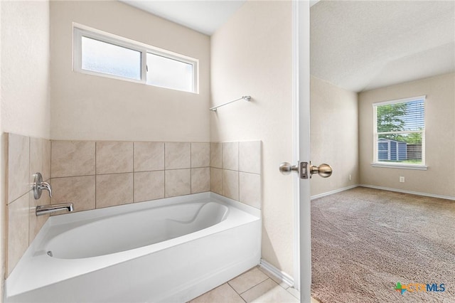 10055 Strasbourg Way, Schertz, TX 78154 - full bathroom featuring a garden tub and baseboards