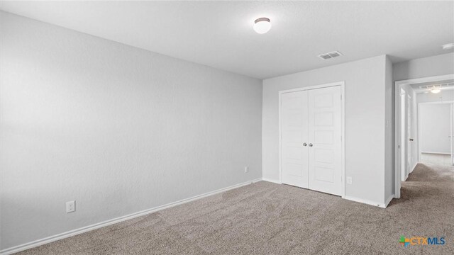 7350 Braes Cor, San Antonio, TX 78244 - unfurnished bedroom with carpet flooring and a closet