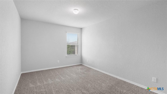 7350 Braes Cor, San Antonio, TX 78244 - unfurnished room featuring carpet flooring and a textured ceiling