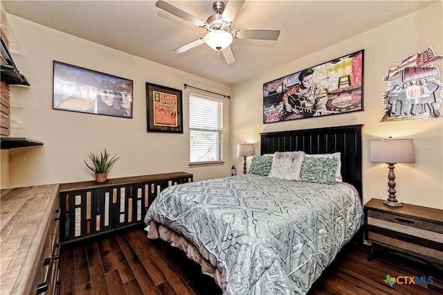 bedroom featuring dark wood-type flooring and ceiling fan