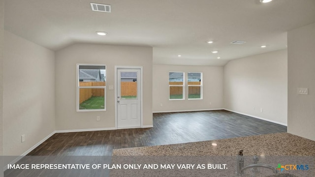 1029 Village Run, Seguin, TX 78155 - empty room with wood finished floors, recessed lighting, baseboards, and lofted ceiling