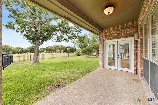 4512 Sunflower Ln, Temple, TX 76502 - view of yard with french doors and a patio