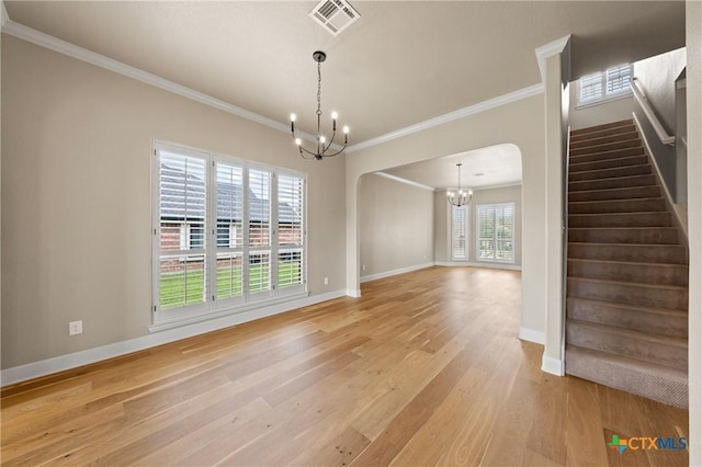 4512 Sunflower Ln, Temple, TX 76502 - unfurnished room with a chandelier, crown molding, light wood-type flooring, stairway, and baseboards