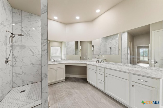 4512 Sunflower Ln, Temple, TX 76502 - bathroom with a marble finish shower, vanity, and recessed lighting