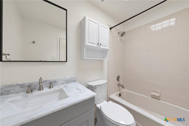 4512 Sunflower Ln, Temple, TX 76502 - bathroom with toilet, vanity, and shower / tub combination