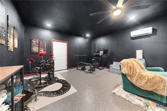 interior space featuring ceiling fan and a wall mounted AC