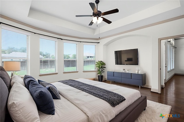 8235 Shining Elk, Garden Ridge, TX 78266 - bedroom featuring a tray ceiling, wood finished floors, and a ceiling fan