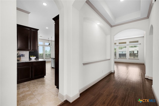 8235 Shining Elk, Garden Ridge, TX 78266 - hallway featuring plenty of natural light, arched walkways, recessed lighting, and light wood-style flooring