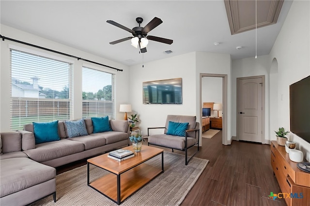 8235 Shining Elk, Garden Ridge, TX 78266 - living room with attic access, dark wood finished floors, a ceiling fan, and arched walkways