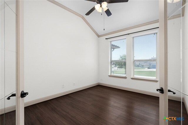 8235 Shining Elk, Garden Ridge, TX 78266 - empty room featuring lofted ceiling, ornamental molding, dark wood finished floors, and a ceiling fan
