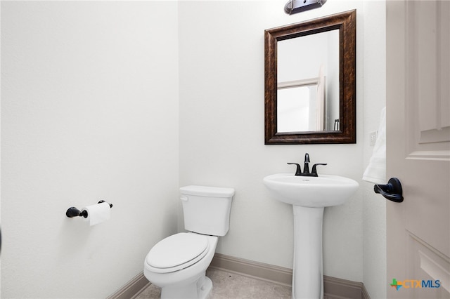 8235 Shining Elk, Garden Ridge, TX 78266 - half bathroom with toilet and baseboards