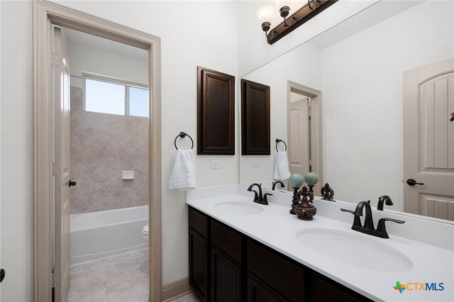 8235 Shining Elk, Garden Ridge, TX 78266 - full bath with double vanity, tile patterned flooring, and tub / shower combination