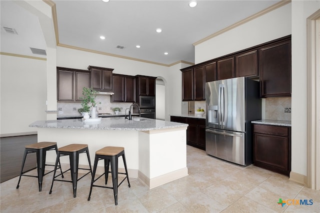 8235 Shining Elk, Garden Ridge, TX 78266 - kitchen featuring stainless steel fridge, ornamental molding, backsplash, recessed lighting, and built in microwave